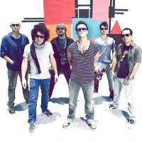 Los Amigos Invisibles — Comodon Johnson
